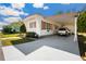 Attractive single-story home with a convenient covered parking area and manicured lawn at 585 Sky Harbor Dr # 416, Clearwater, FL 33759