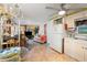 Open layout featuring a living room, kitchen with bright cabinets and a dining table at 585 Sky Harbor Dr # 416, Clearwater, FL 33759