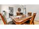 A beautifully decorated dining room featuring a chandelier and seating for four people at 6213 Sheldon Rd, Tampa, FL 33615
