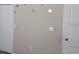 Bright bedroom with closet space, neutral walls, and a white door at 6359 Timberly Ln, Zephyrhills, FL 33542