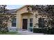 Charming home showcasing a covered front entrance, well-maintained landscaping, and a welcoming appeal at 6359 Timberly Ln, Zephyrhills, FL 33542