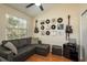 Cozy living room with unique decor, including records and guitars on the wall at 720 Earls Ct, Safety Harbor, FL 34695