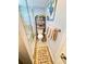 Bathroom with glass-enclosed shower, toilet, decorative storage, rug, and neutral paint at 8911 Blind Pass Rd # 220, St Pete Beach, FL 33706
