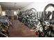 Interior bike storage room with rows of bicycles on a rack at 8911 Blind Pass Rd # 220, St Pete Beach, FL 33706