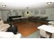 Spacious community room with a kitchenette, bar, and ample seating for social gatherings at 8911 Blind Pass Rd # 220, St Pete Beach, FL 33706