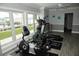 Community gym with cardio equipment, scenic views, and great natural light at 8911 Blind Pass Rd # 220, St Pete Beach, FL 33706