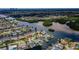 A stunning aerial view captures the beauty of a waterfront neighborhood and canals at 1327 51St Ne Ave, St Petersburg, FL 33703