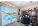 Home office with sliding glass doors to the pool area at 1327 51St Ne Ave, St Petersburg, FL 33703