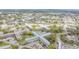 Expansive aerial view showcases the large condominium complex and surrounding neighborhood amenities at 2042 Australia W Way # 66, Clearwater, FL 33763
