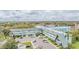 Spacious condominium complex featuring well-maintained landscaping and ample parking in a convenient location at 2042 Australia W Way # 66, Clearwater, FL 33763