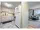 Connected kitchen and living space provides an open floor plan and natural light at 2042 Australia W Way # 66, Clearwater, FL 33763
