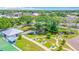 Scenic view of a community pond and gazebo surrounded by lush greenery and trees at 2042 Australia W Way # 66, Clearwater, FL 33763
