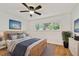 Comfortable bedroom featuring a bed, large window, and tasteful decor for a cozy retreat at 2220 Spanish Dr # 4, Clearwater, FL 33763