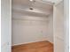 Walk-in closet with hardwood floors and shelving at 2220 Spanish Dr # 4, Clearwater, FL 33763
