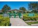 Community dog park entrance with separate areas for small and large dogs, ensuring a safe and enjoyable experience at 2220 Spanish Dr # 4, Clearwater, FL 33763