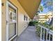 Exterior shot of unit with well-kept garden and balcony at 2220 Spanish Dr # 4, Clearwater, FL 33763