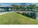 Beautiful view of a lakeside community pavilion with outdoor seating, enhancing the park's recreational appeal at 2220 Spanish Dr # 4, Clearwater, FL 33763