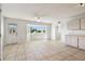Bright kitchen and eat-in area with tile flooring, ceiling fan, and natural light from a bay window at 2220 Spanish Dr # 4, Clearwater, FL 33763