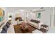 Bright living room with modern decor, neutral furniture, and stylish coffee table at 2220 Spanish Dr # 4, Clearwater, FL 33763