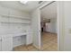 Pantry/office space with built-in desk and shelves, adjacent to kitchen at 2220 Spanish Dr # 4, Clearwater, FL 33763