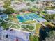 Aerial view of the community with tennis courts, walking paths, and common areas at 2220 Spanish Dr # 4, Clearwater, FL 33763