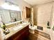 Updated bathroom showcases a modern vanity, stylish mirror, and a shower-tub combo for a fresh, contemporary feel at 2351 Irish Ln # 43, Clearwater, FL 33763