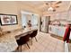 Updated kitchen featuring white cabinets, stainless appliances and a tiled floor at 2351 Irish Ln # 43, Clearwater, FL 33763