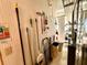 Practical storage area with pegboard wall, offering convenient organization for cleaning supplies and household items at 2351 Irish Ln # 43, Clearwater, FL 33763