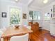 Cozy dining area with a wooden table overlooking the backyard at 2513 W Morrison Ave, Tampa, FL 33629