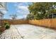 Expansive backyard featuring a fence, patio, and ample space, perfect for outdoor activities and relaxation at 3002 N 16Th St, Tampa, FL 33605