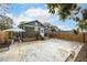 Inviting backyard with string lights, patio furniture, and a fence, perfect for outdoor gatherings at 3002 N 16Th St, Tampa, FL 33605