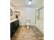 Bright bathroom showcasing a vanity, toilet, and glass shower at 34344 Timberland Blvd, Wesley Chapel, FL 33543