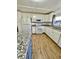 Bright kitchen with granite countertops and modern white appliances at 34344 Timberland Blvd, Wesley Chapel, FL 33543