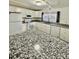 Bright, modern kitchen with white cabinets and stainless appliances at 34344 Timberland Blvd, Wesley Chapel, FL 33543
