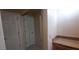 Hallway leading to bathroom and closet with granite topped vanity at 3859 Pheasant Ct, Palm Harbor, FL 34685