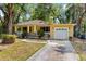 Front exterior of a beautiful house featuring a well-maintained lawn and inviting curb appeal at 3908 Alafia Blvd, Brandon, FL 33511