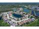 Picturesque aerial view of a community featuring homes surrounding a series of serene lakes at 4029 Savage Station Cir, New Port Richey, FL 34653