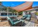 Backyard featuring a seating area, pergola, and partial view of the pool at 4135 Beach Se Dr, St Petersburg, FL 33705