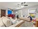 Bright open living space with a dining area, comfortable seating, and stylish decor creating an inviting atmosphere at 4135 Beach Se Dr, St Petersburg, FL 33705