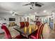 Open living space featuring a dining area, living room, and kitchen with hardwood floors and stylish decor at 4135 Beach Se Dr, St Petersburg, FL 33705