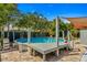 This backyard features a refreshing above-ground pool, complete with a deck, perfect for outdoor fun at 4135 Beach Se Dr, St Petersburg, FL 33705