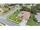 Desirable home boasts a screened-in pool, lush landscaping and a spacious driveway, located in a tranquil neighborhood at 5088 Championship Cup Ln, Spring Hill, FL 34609