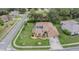 Well-maintained home features a screened-in pool and lush landscaping in a peaceful neighborhood at 5088 Championship Cup Ln, Spring Hill, FL 34609