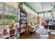 Bright Florida room featuring windows, comfortable seating and decor at 5088 Championship Cup Ln, Spring Hill, FL 34609