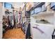 Spacious walk-in closet with ample shelving and storage solutions for shoes, bags, and clothing at 5088 Championship Cup Ln, Spring Hill, FL 34609