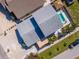 Backyard aerial view of a home with a pool and shaded patio area at 5526 14Th S Ave, Gulfport, FL 33707
