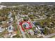 Aerial view of a blue two-story home with a neighborhood overview and a red home boundary at 5526 14Th S Ave, Gulfport, FL 33707