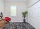 Cozy bedroom featuring a neutral color palette, a shuttered window, a plant, and closet space at 5526 14Th S Ave, Gulfport, FL 33707