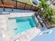 Aerial view of a private swimming pool with a waterfall feature and a landscaped backyard at 5526 14Th S Ave, Gulfport, FL 33707
