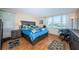 Bright bedroom features a waterfront view and a large window for plenty of natural light at 7405 Bay Island S Dr # 220, South Pasadena, FL 33707